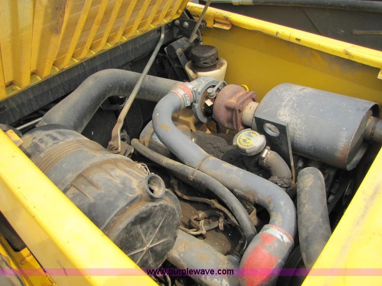 image for item 8671 New Holland LS180 skid steer