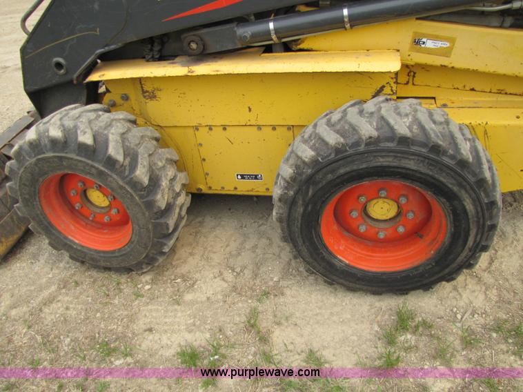 image for item 8671 New Holland LS180 skid steer