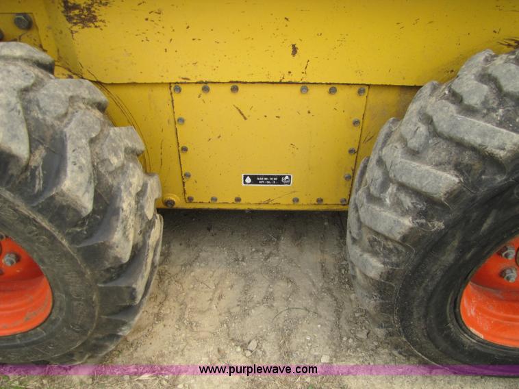 image for item 8671 New Holland LS180 skid steer
