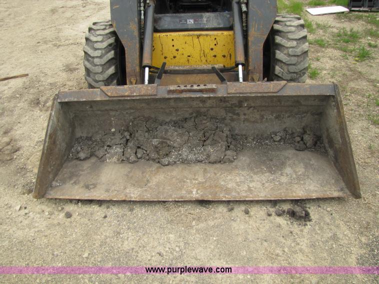 image for item 8671 New Holland LS180 skid steer