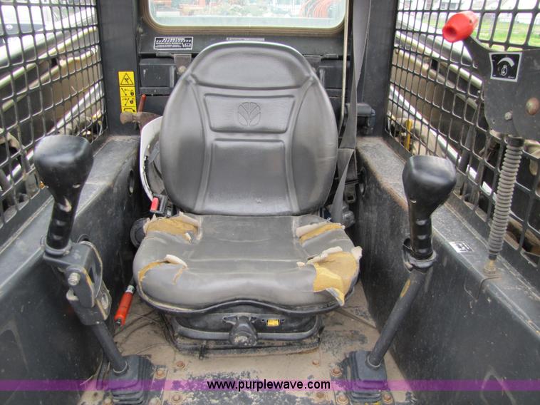 image for item 8671 New Holland LS180 skid steer