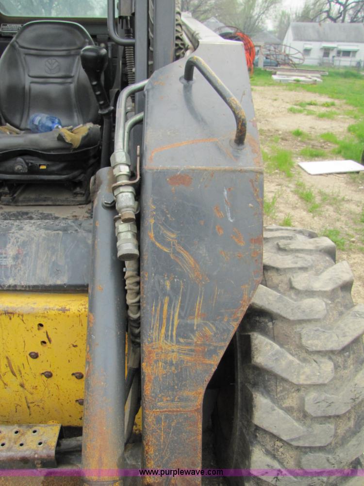 image for item 8671 New Holland LS180 skid steer