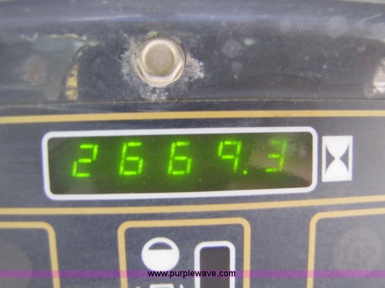 image for item 8671 New Holland LS180 skid steer