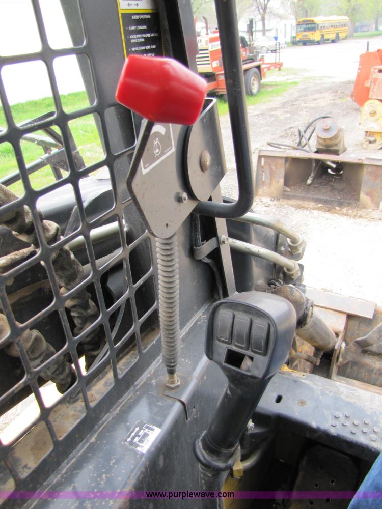 image for item 8671 New Holland LS180 skid steer