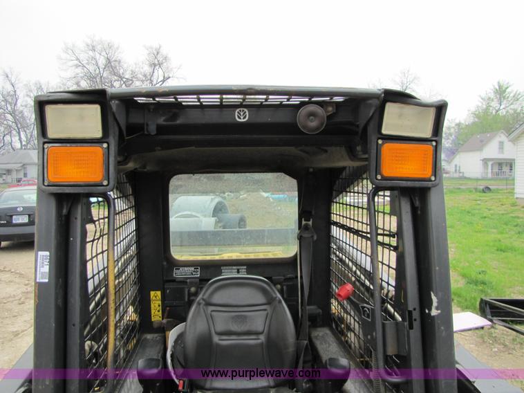 image for item 8671 New Holland LS180 skid steer