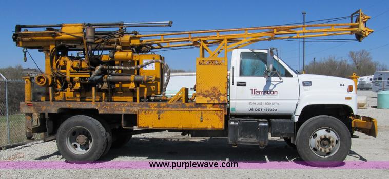 image for item 8990 1998 GMC C7500 truck with CME drilling attachment