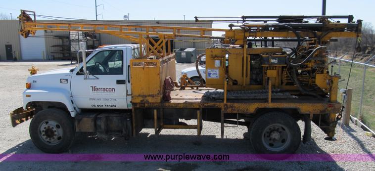 image for item 8990 1998 GMC C7500 truck with CME drilling attachment