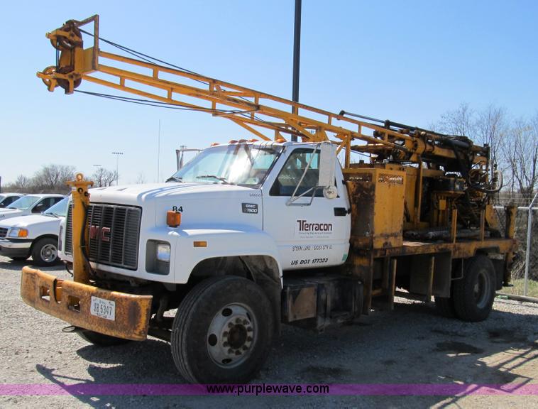 image for item 8990 1998 GMC C7500 truck with CME drilling attachment