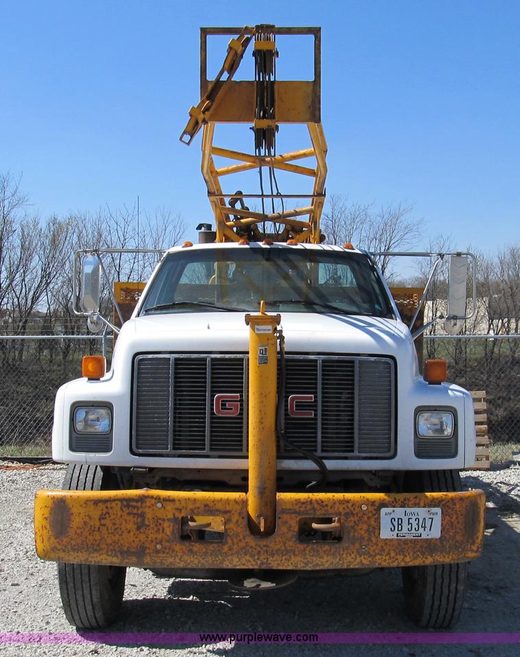 image for item 8990 1998 GMC C7500 truck with CME drilling attachment