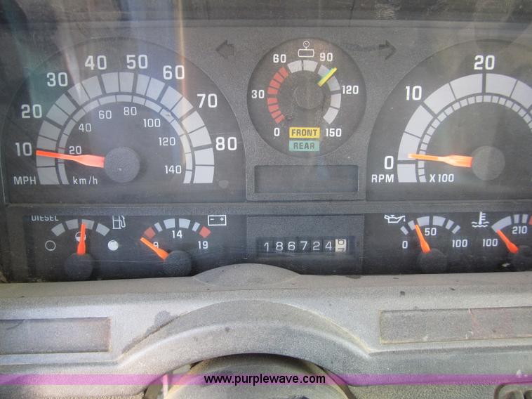 image for item 8990 1998 GMC C7500 truck with CME drilling attachment