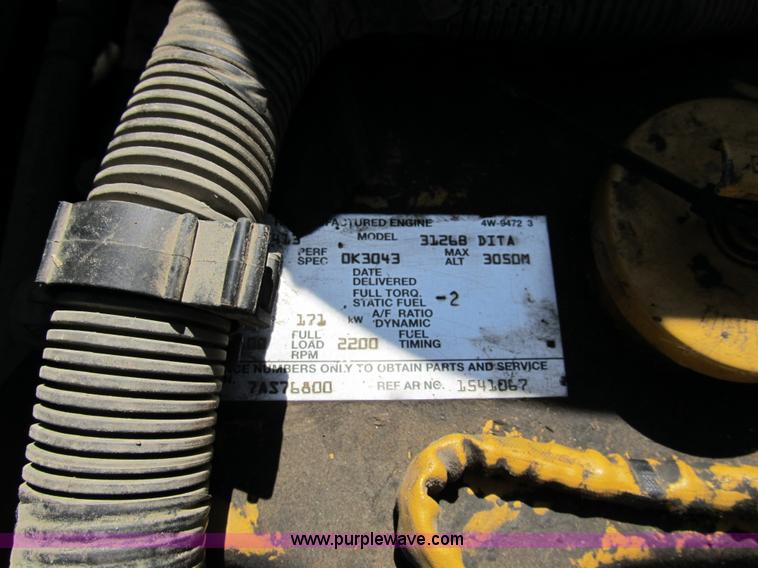 image for item 8990 1998 GMC C7500 truck with CME drilling attachment