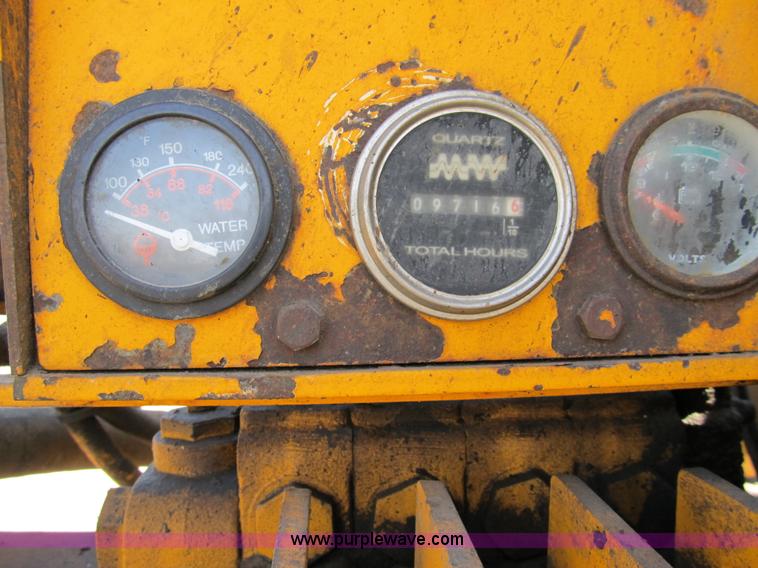 image for item 8990 1998 GMC C7500 truck with CME drilling attachment