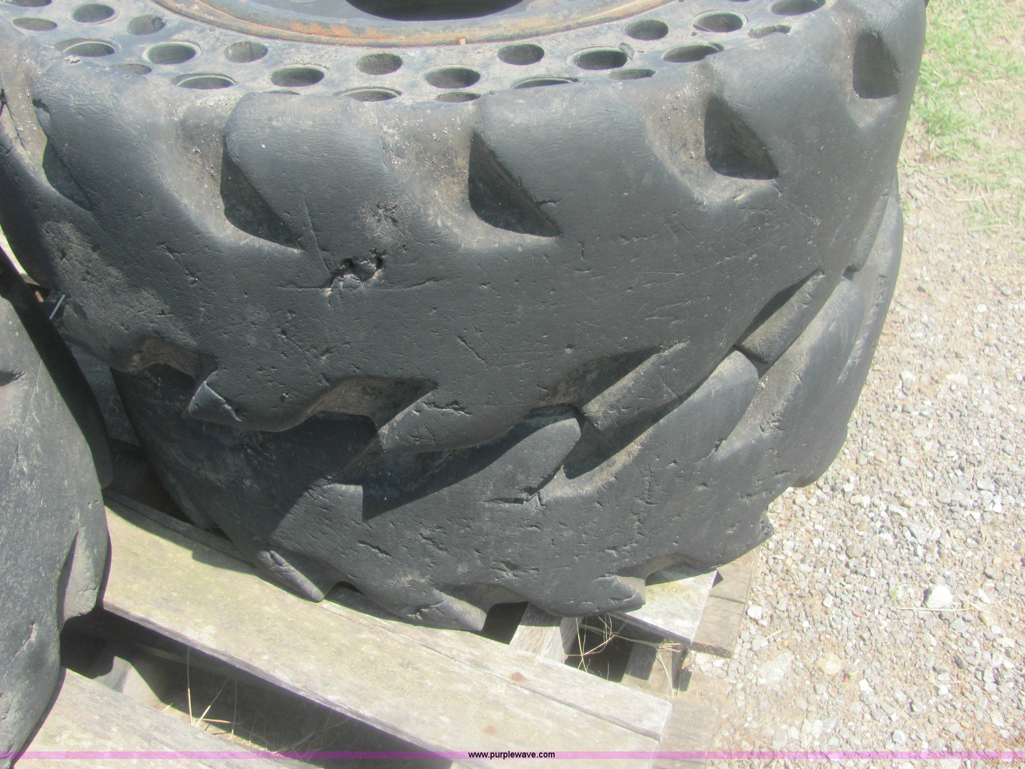 (4) 10.0016 skid loader tires and wheels in Mayfield, KS Item 6944