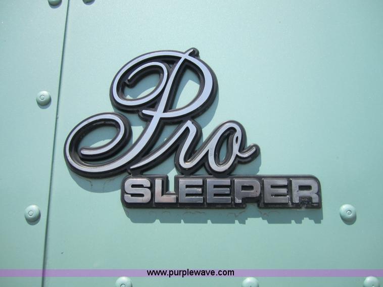 image for item 3856 1998 International 9400 Eagle semi truck