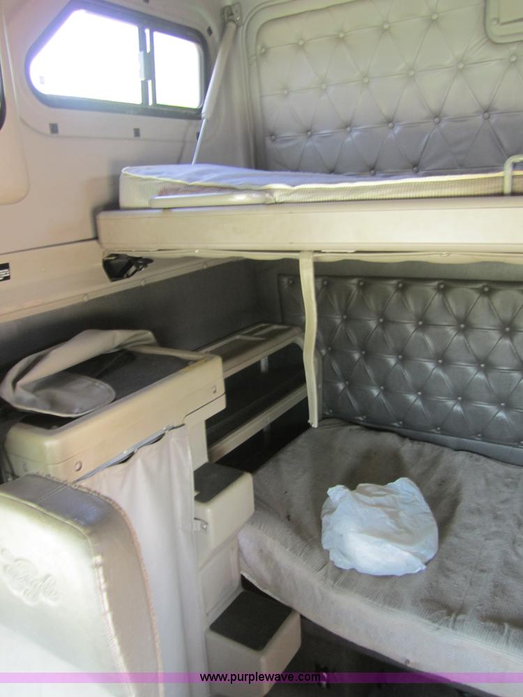 image for item 3856 1998 International 9400 Eagle semi truck