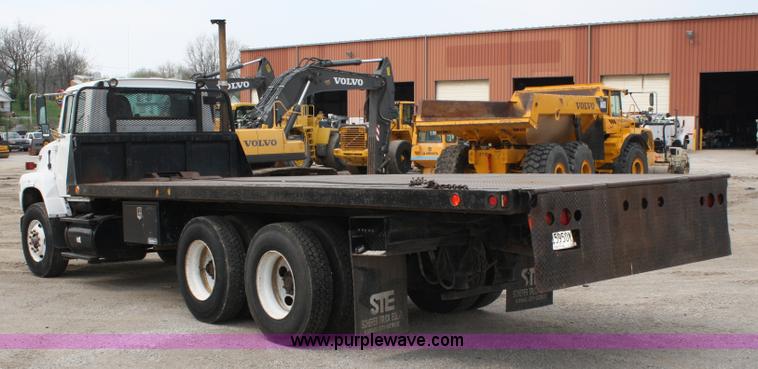 image for item 4908 1994 Ford LTS8000 Rollback semi truck