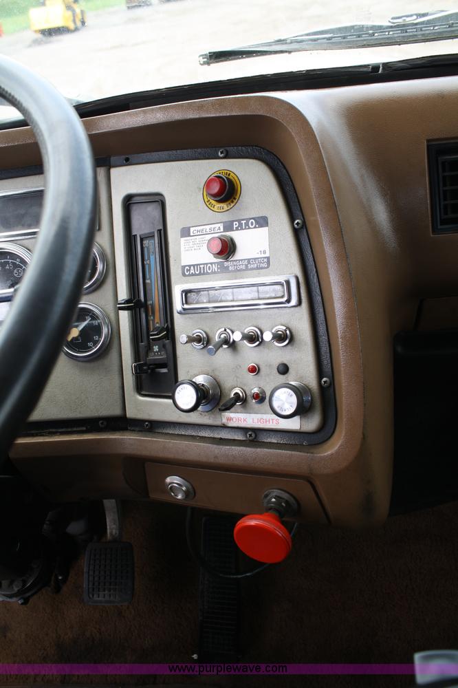 image for item 4908 1994 Ford LTS8000 Rollback semi truck