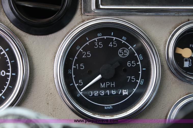 image for item 4908 1994 Ford LTS8000 Rollback semi truck