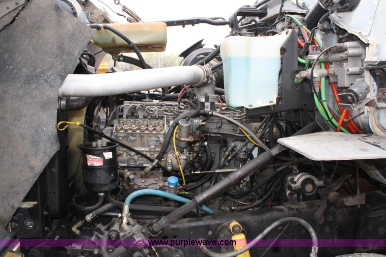 image for item 4908 1994 Ford LTS8000 Rollback semi truck