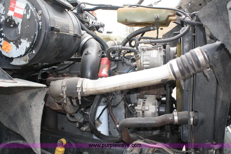 image for item 4908 1994 Ford LTS8000 Rollback semi truck