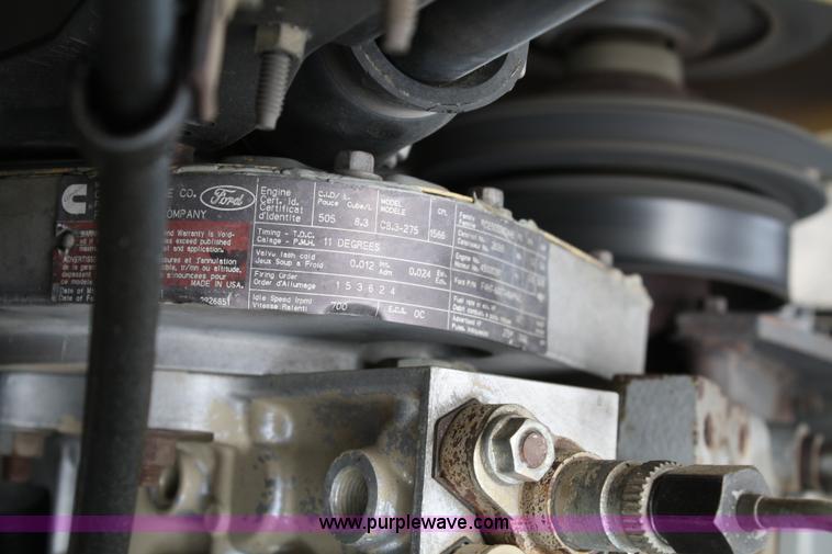 image for item 4908 1994 Ford LTS8000 Rollback semi truck