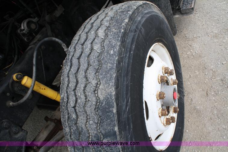 image for item 4908 1994 Ford LTS8000 Rollback semi truck