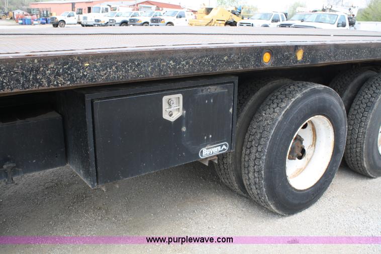 image for item 4908 1994 Ford LTS8000 Rollback semi truck