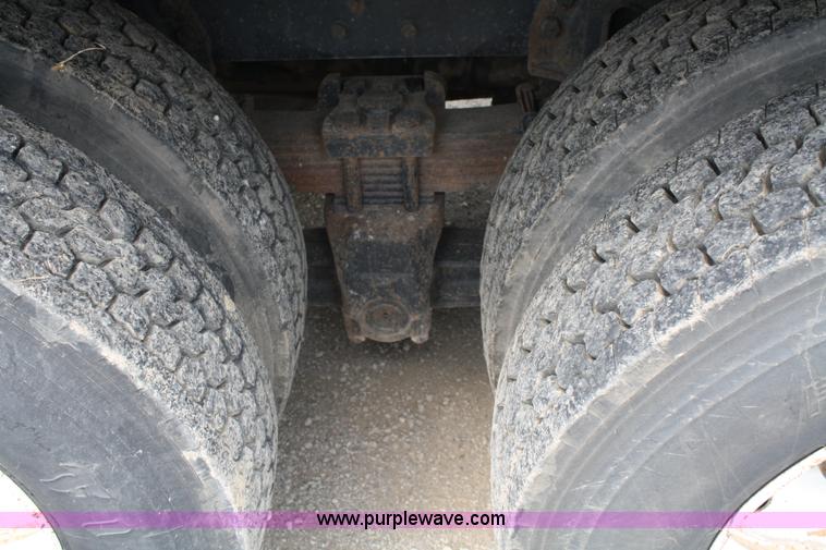 image for item 4908 1994 Ford LTS8000 Rollback semi truck