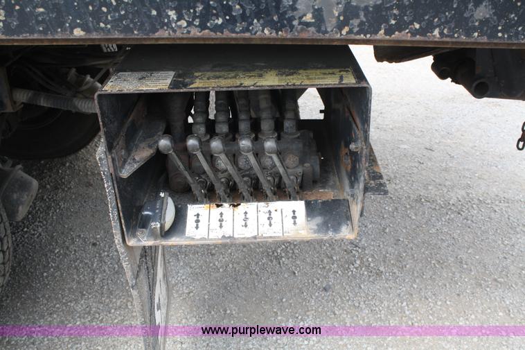 image for item 4908 1994 Ford LTS8000 Rollback semi truck