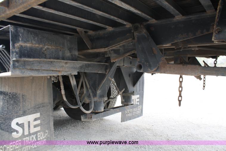 image for item 4908 1994 Ford LTS8000 Rollback semi truck