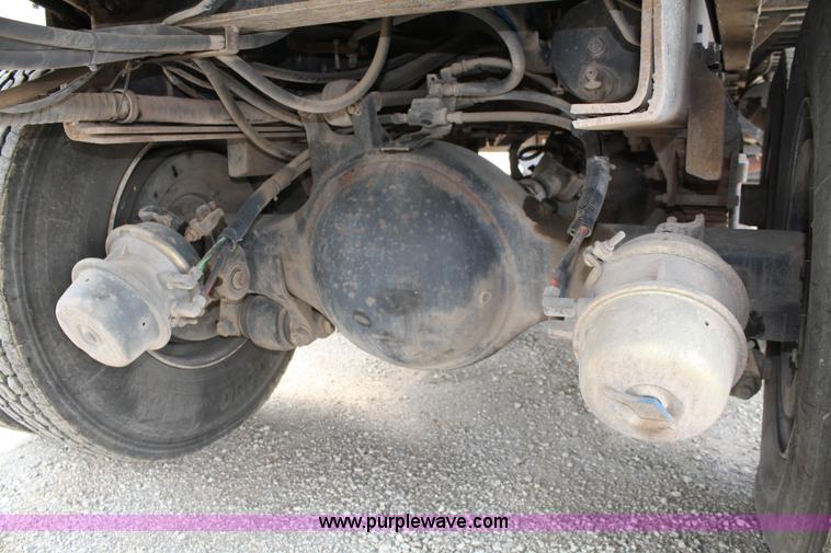 image for item 4908 1994 Ford LTS8000 Rollback semi truck