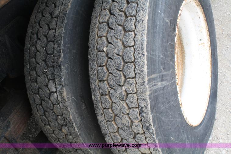 image for item 4908 1994 Ford LTS8000 Rollback semi truck