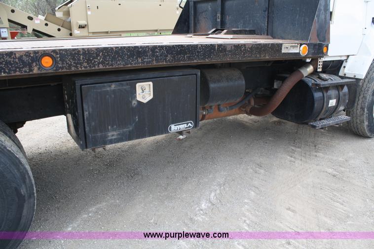 image for item 4908 1994 Ford LTS8000 Rollback semi truck