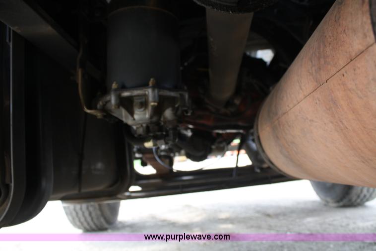 image for item 4908 1994 Ford LTS8000 Rollback semi truck