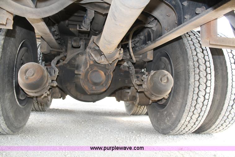 image for item 4908 1994 Ford LTS8000 Rollback semi truck