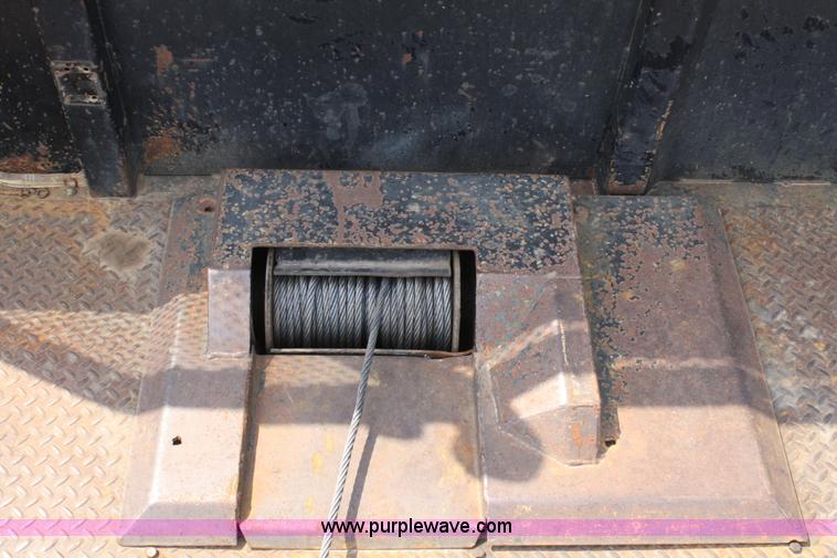 image for item 4908 1994 Ford LTS8000 Rollback semi truck