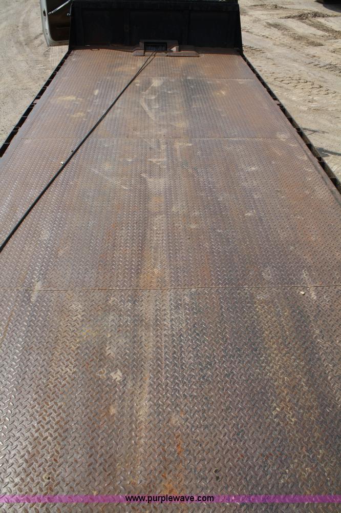 image for item 4908 1994 Ford LTS8000 Rollback semi truck