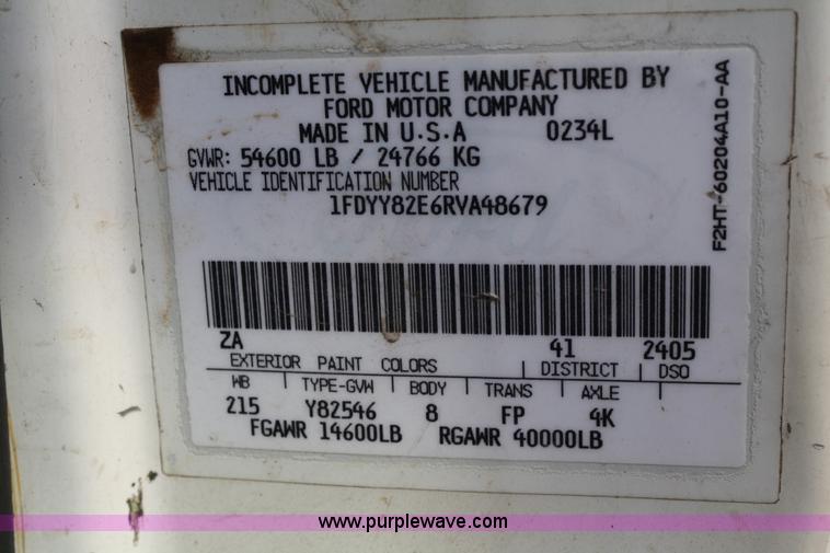 image for item 4908 1994 Ford LTS8000 Rollback semi truck