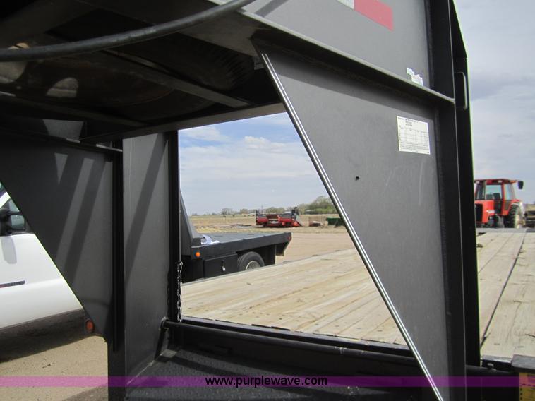 image for item 2976 2006 May 30' flatbed goose neck trailer
