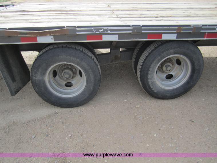 image for item 2976 2006 May 30' flatbed goose neck trailer