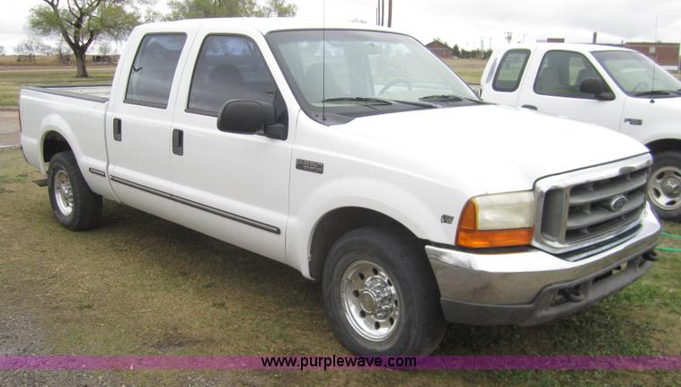 image for item 2987 1999 Ford F250 XLT crew cab pickup truck