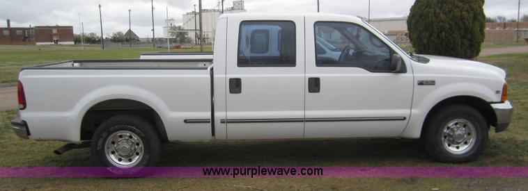 image for item 2987 1999 Ford F250 XLT crew cab pickup truck