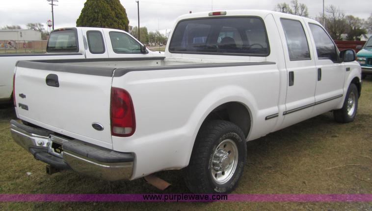 image for item 2987 1999 Ford F250 XLT crew cab pickup truck