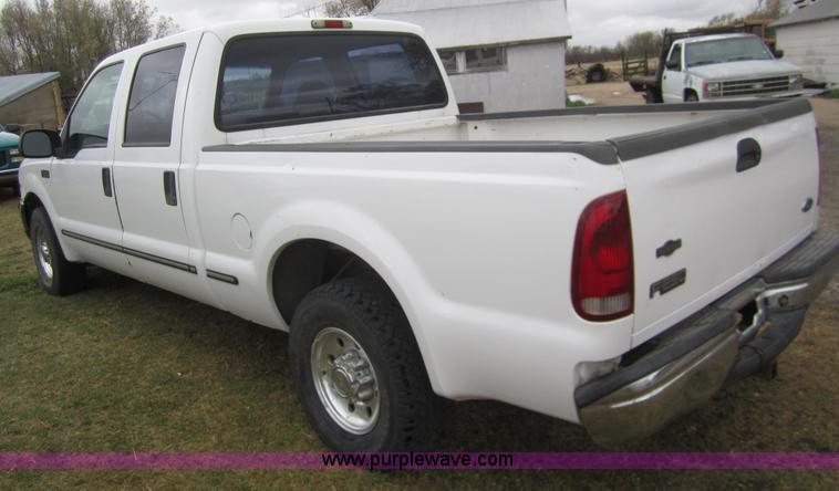 image for item 2987 1999 Ford F250 XLT crew cab pickup truck