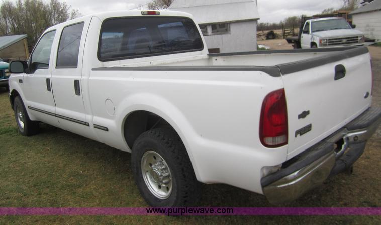 image for item 2987 1999 Ford F250 XLT crew cab pickup truck