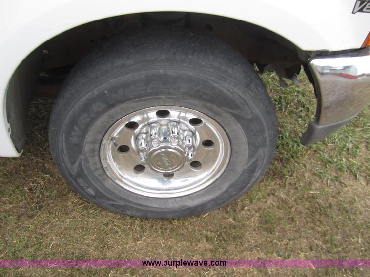 image for item 2987 1999 Ford F250 XLT crew cab pickup truck