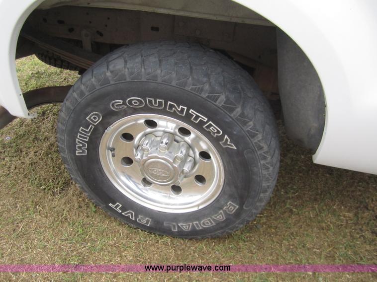 image for item 2987 1999 Ford F250 XLT crew cab pickup truck