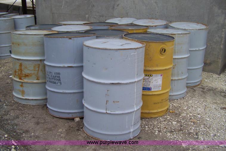 image for item 7353 (14) 55 gallon metal paint barrels