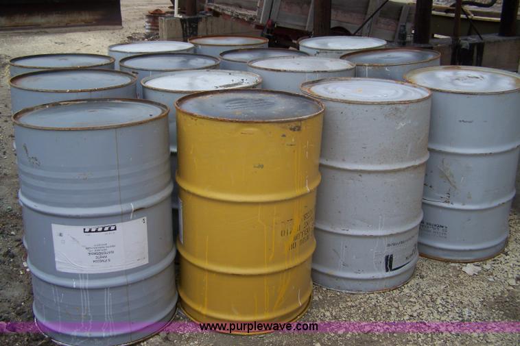 image for item 7354 (14) 55 gallon metal paint barrels