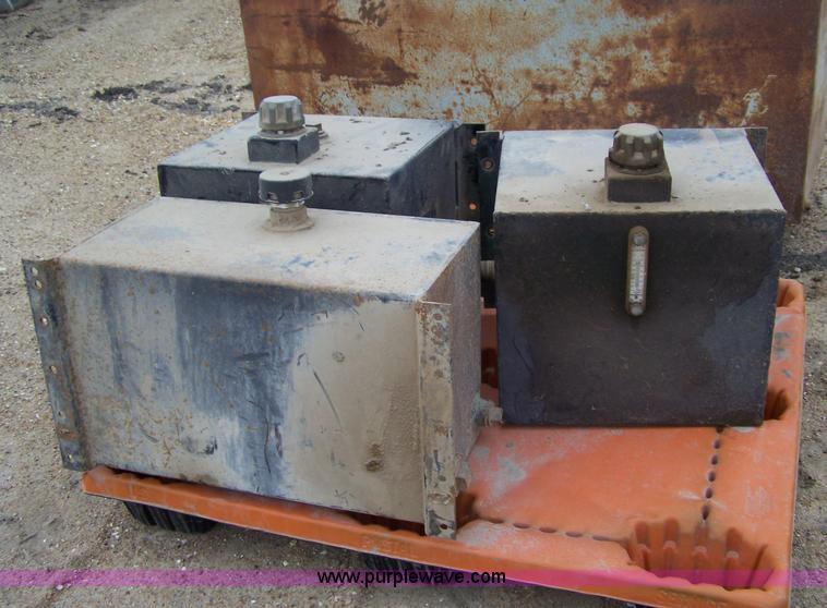 image for item 7356 (3) metal oil reservoir tanks